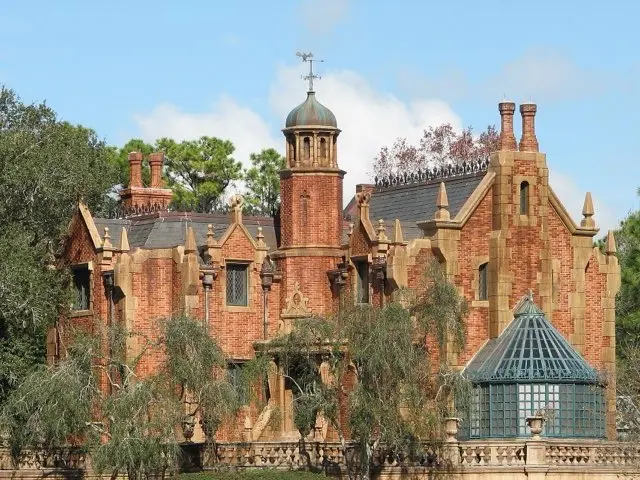 The brick gothic manor of the Haunted Mansion at Magic Kingdom